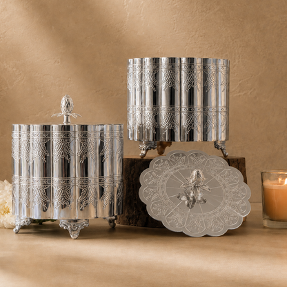 Luxury silver engraved storage container set with decorative lids, handcrafted premium metal storage jars for elegant home décor and tabletop styling by Inara Home Decor.