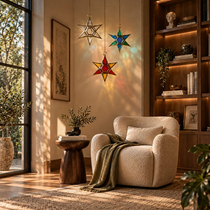 Luxury living room featuring handcrafted stained glass hanging star lanterns with brass frames, creating colorful light reflections and elegant indoor home décor.