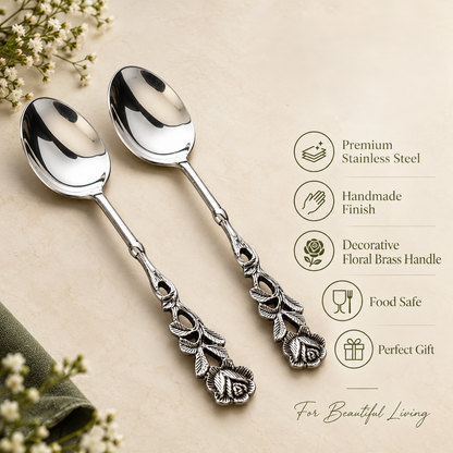Premium stainless steel spoon set with decorative floral brass handles, showcasing elegant design, rust-resistant durability, and gift-worthy craftsmanship on a warm beige background by Inara Home Decor.