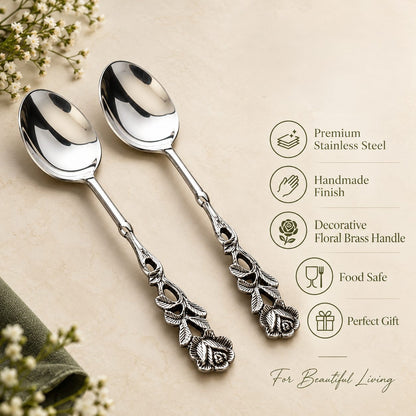 Premium stainless steel spoon set with decorative floral brass handles, showcasing elegant design, rust-resistant durability, and gift-worthy craftsmanship on a warm beige background by Inara Home Decor.