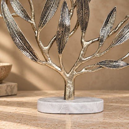 Premium metal olive tree sculpture featuring a solid white marble base with elegant handcrafted branches and textured leaves.