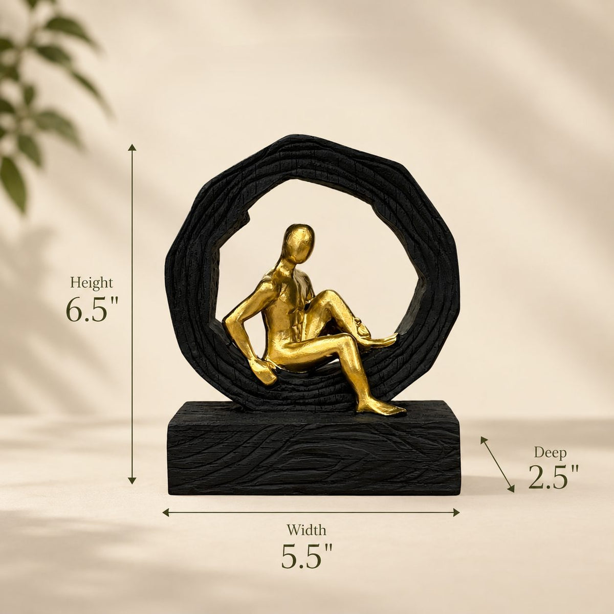 Dimension guide for a modern gold and black resin decorative sculpture measuring 6.5 inches high, 5.5 inches wide, and 2.5 inches deep.