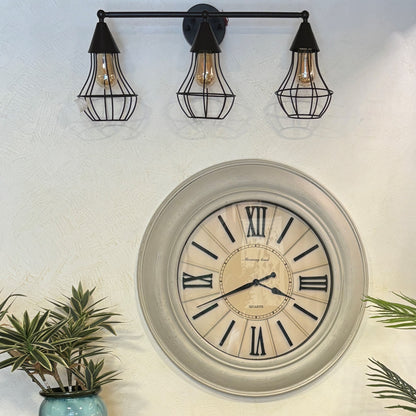 Modern White Wall Clock – A stylized wall clock adds a touch of whimsy to your decor | INARA