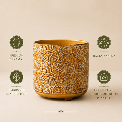 Features infographic of a mustard yellow embossed ceramic planter highlighting premium ceramic, handcrafted design, embossed leaf texture, and decorative indoor/outdoor use.