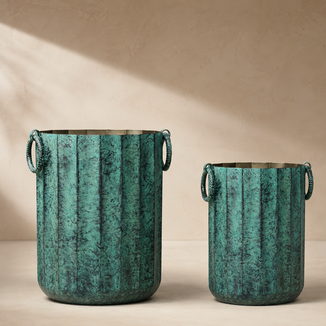 Luxury green textured metal planter set with decorative ring handles in two sizes for modern indoor home décor.