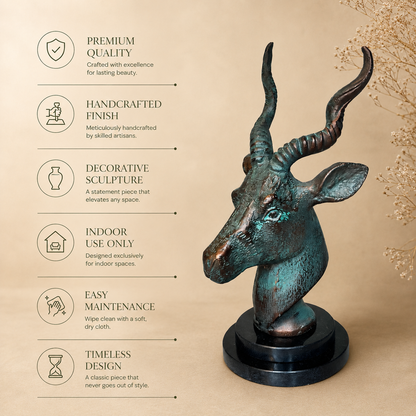 Premium handcrafted antelope head sculpture with verdigris finish on a black base, showcasing premium quality, handcrafted finish, decorative design, indoor use, easy maintenance, and timeless luxury craftsmanship by Inara Home Decor.