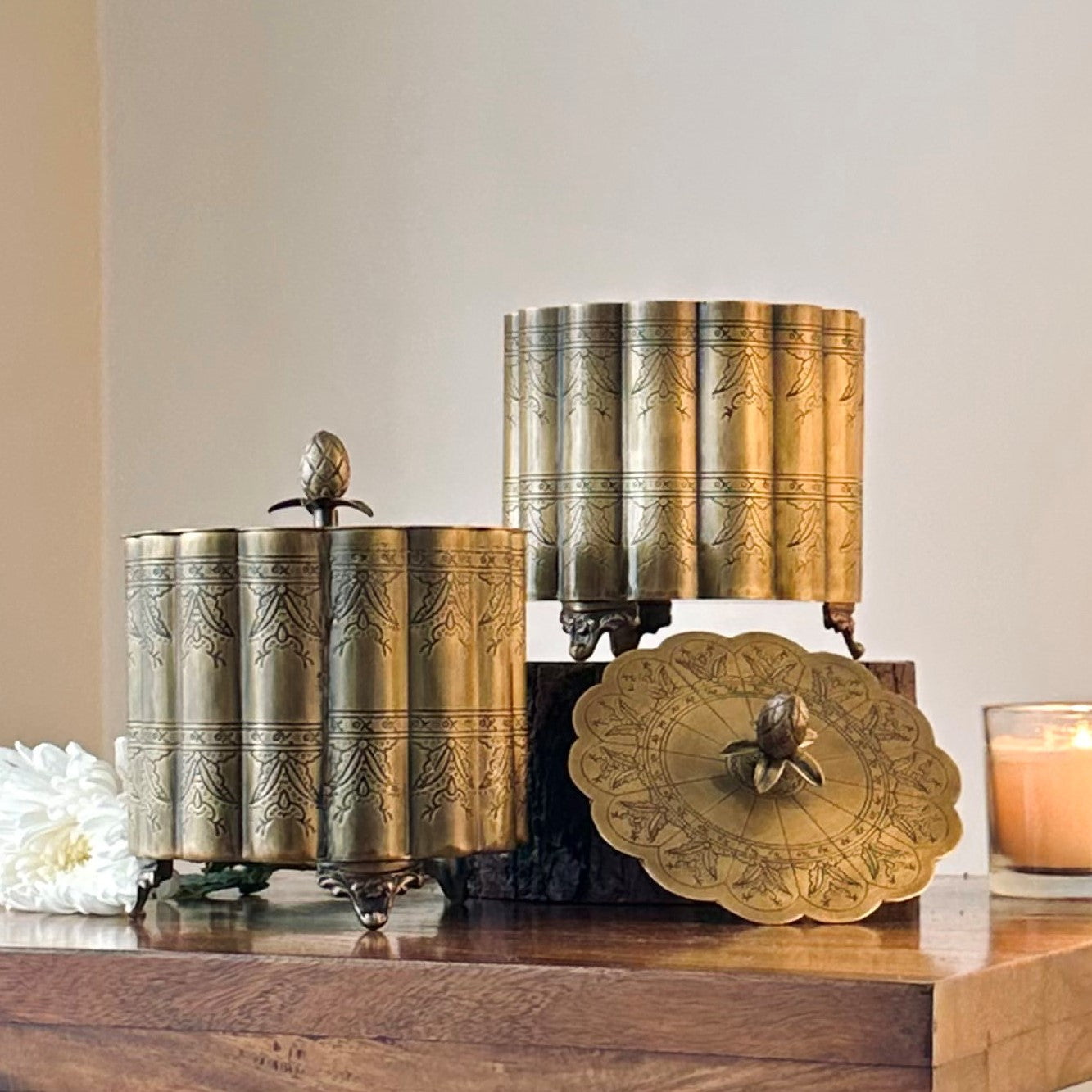 Premium brass keepsake box in antique gold finish with engraved detailing, round decorative storage container with lid styled for luxury home décor and festive gifting