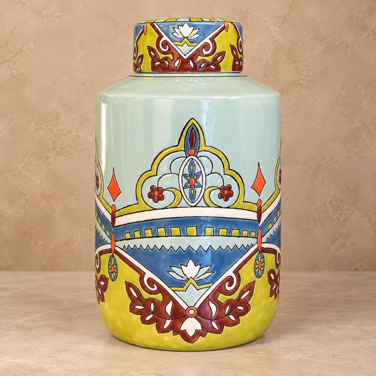 Premium hand-painted ceramic ginger jar featuring colorful floral motifs and a glossy finish, ideal as a decorative accent for luxury interiors.