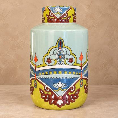 Premium hand-painted ceramic ginger jar featuring colorful floral motifs and a glossy finish, ideal as a decorative accent for luxury interiors.