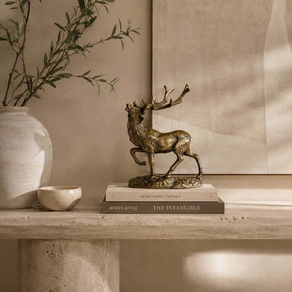 Royal Stag handcrafted antique brass deer sculpture with majestic antlers showcased from multiple angles, highlighting intricate artisan detailing, premium antique finish, and elegant styling for luxury living room, office, and console table décor.