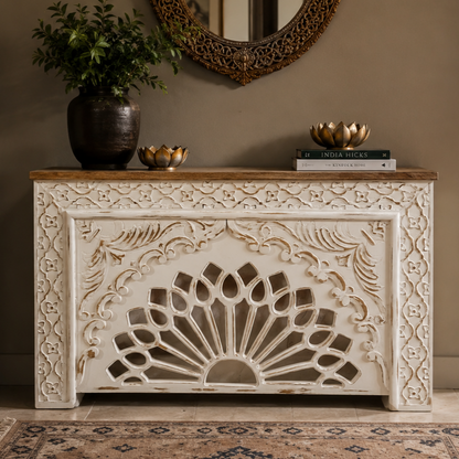 Hand-carved distressed white solid mango wood console table with intricate floral detailing styled in a luxury home entrance with elegant décor.