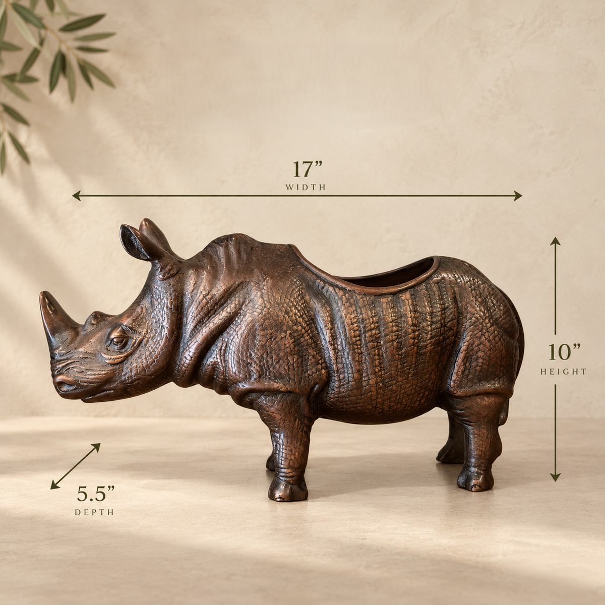 Dimensions of the Inara Home Decor Rhinoceros Champagne Wine Chiller measuring 17 inches wide, 10 inches high and 5.5 inches deep.