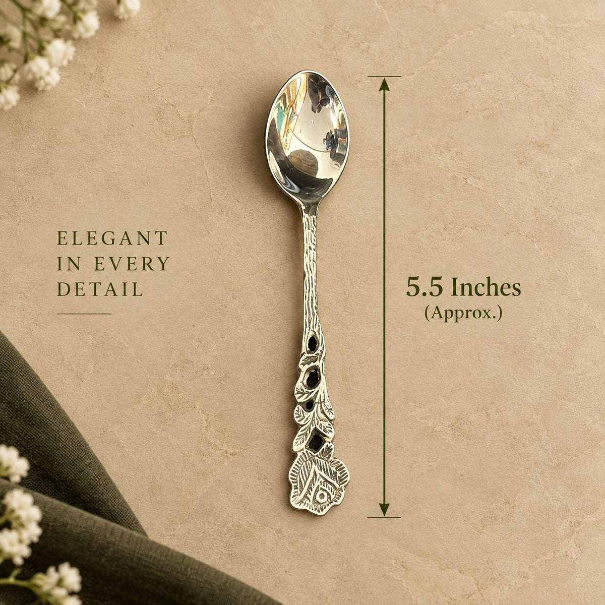Rose coffee spoon shown with its 5.5 inch length marked, on a warm beige background.