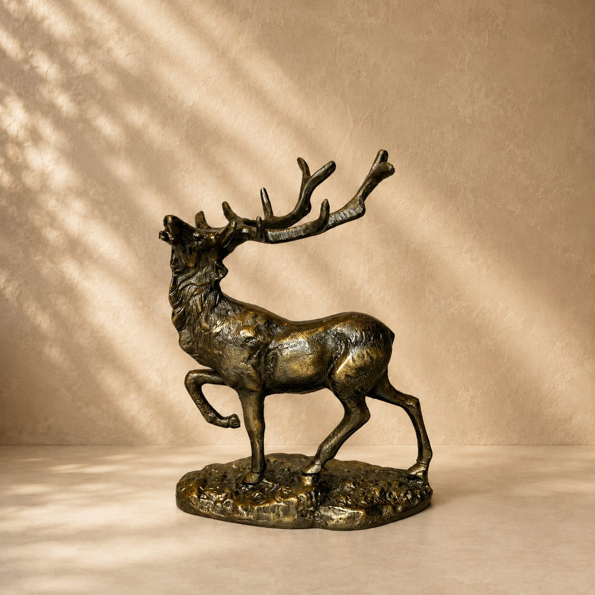 Royal Stag handcrafted antique brass deer sculpture with majestic antlers, luxury tabletop décor for living rooms, offices, and console styling.