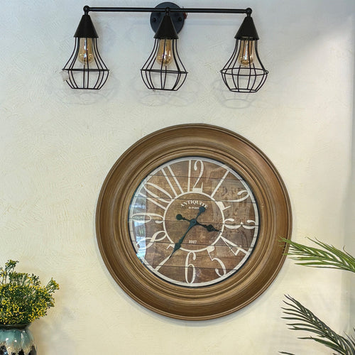 Rustic Light Brown Wall Clock – A stylized wall clock adds a touch of whimsy to your decor | INARA