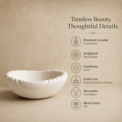 Premium white ceramic urli showcasing sculptural scalloped design, sandstone finish, decorative centerpiece use, and luxury home décor features.