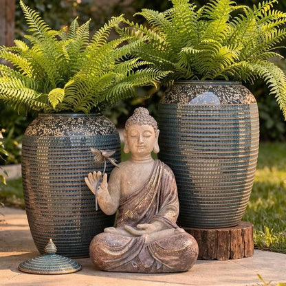 Meditating Buddha figurine featured in a cozy evening setting with glowing wicker lanterns and tea light candles on a rustic wooden patio.