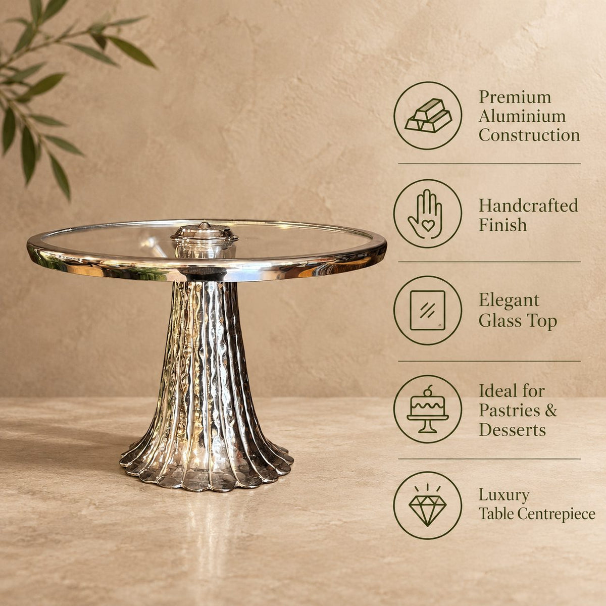 Features an infographic of a silver pedestal serving stand with glass top highlighting premium aluminium construction, handcrafted finish, elegant glass top, and luxury design.