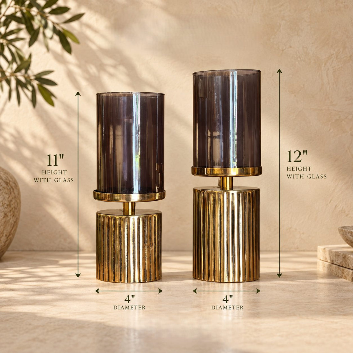 Dimensions of smoked glass and gold metal candle holder set showing 11-inch and 12-inch heights with 4-inch diameter.