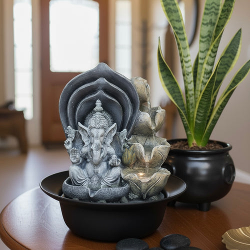 Divine Ganesha Resin Tabletop Fountain – Exquisitely sculpted Lord Ganesha sits beneath a grand, lotus-inspired canopy, a symbol of divine | INARA