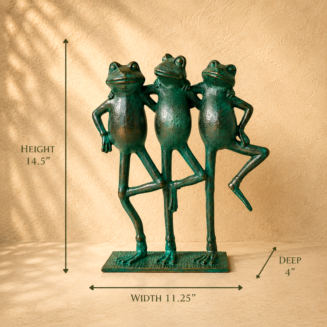 Three Frogs decorative metal sculpture with verdigris finish showing dimensions 14.5 inches high, 11.25 inches wide, and 4 inches deep on a premium beige studio backdrop by Inara Home Decor.