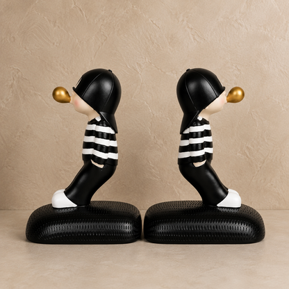 Boy and girl bookend set, black and white striped design with gold bubble accent