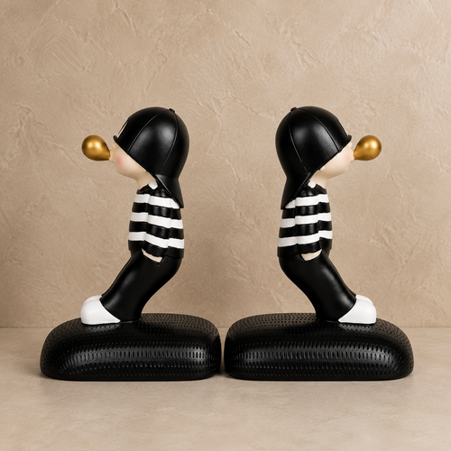Cute Boy Blowing Bookend