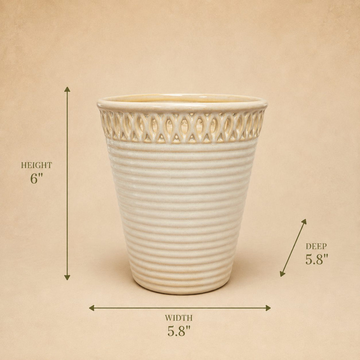 Cream glazed ceramic planter with decorative cutwork rim, 6-inch height, 5.8-inch width and depth dimensions.
