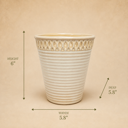 Cream glazed ceramic planter with decorative cutwork rim, 6-inch height, 5.8-inch width and depth dimensions.